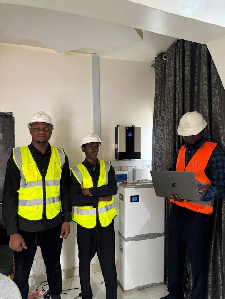 BrainVolt engineers commissioning a solar and battery system